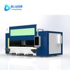 Internal cutting chamber close-up of enclosed laser cutter showing laser head and precision guide rail