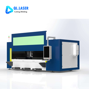 Internal cutting chamber close-up of enclosed laser cutter showing laser head and precision guide rail